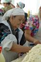 saleswoman at the bazar - samarkand, usbekistan